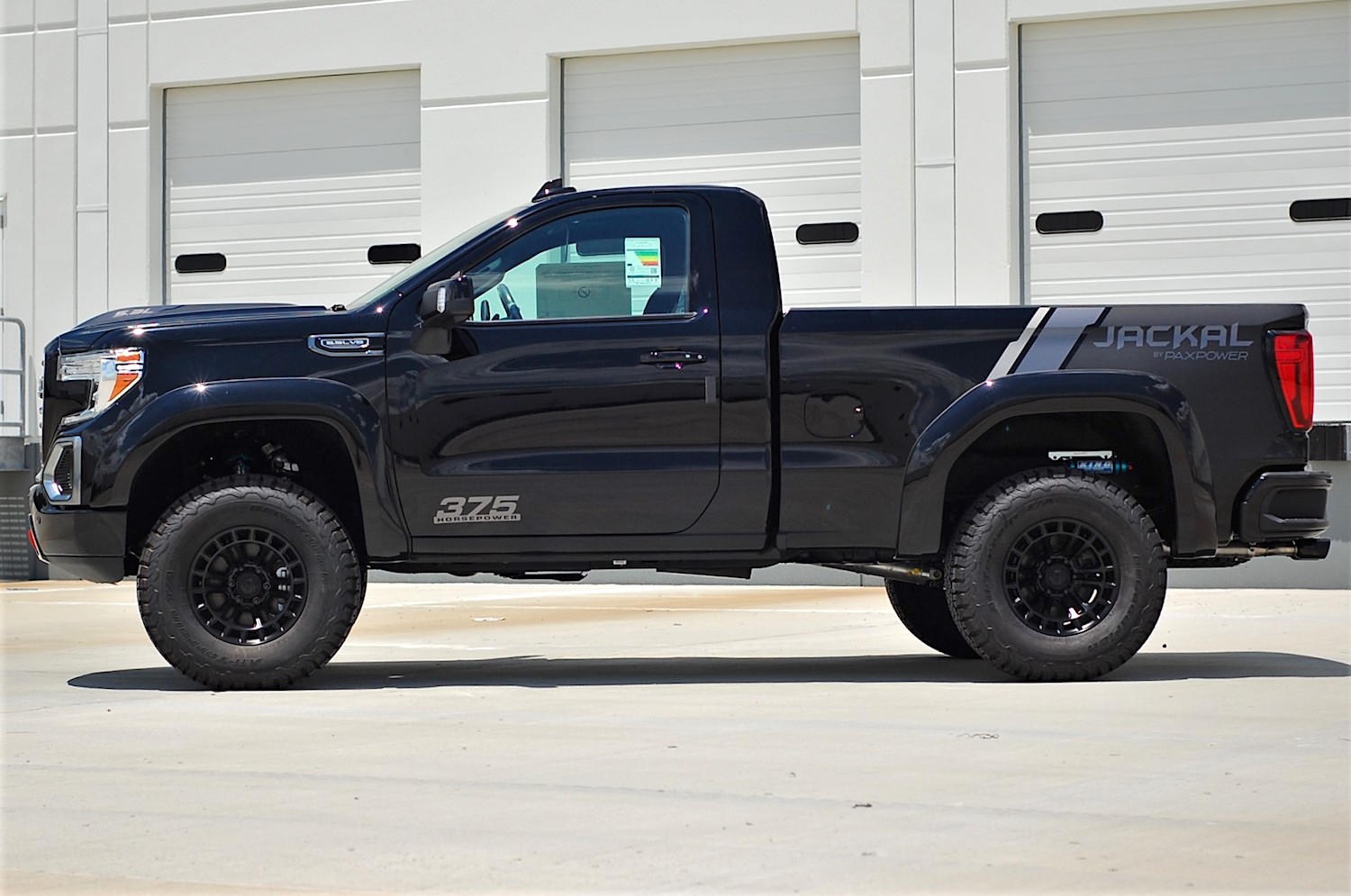 This GMC Sierra Jackal By PaxPower Packs a Widebody Kit with King